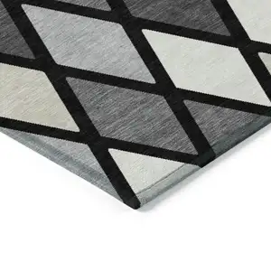 Photo of Black Gray And Ivory Geometric Washable Indoor Outdoor Area Rug