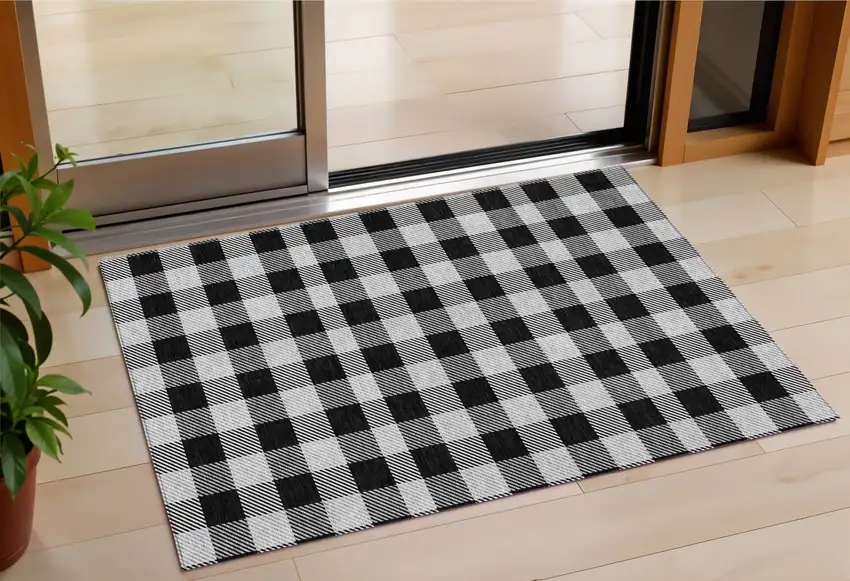 Black Gray And Ivory Plaid Washable Indoor Outdoor Area Rug Photo 1