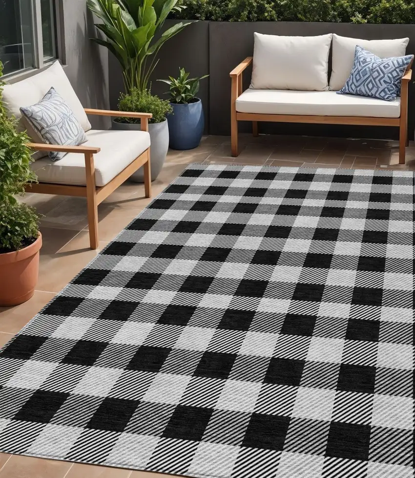 Black Gray And Ivory Plaid Washable Indoor Outdoor Area Rug Photo 1