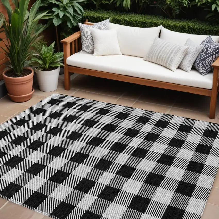 Black Gray And Ivory Plaid Washable Indoor Outdoor Area Rug Photo 1