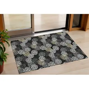 Photo of Black Gray And Ivory Polka Dot Washable Indoor Outdoor Area Rug