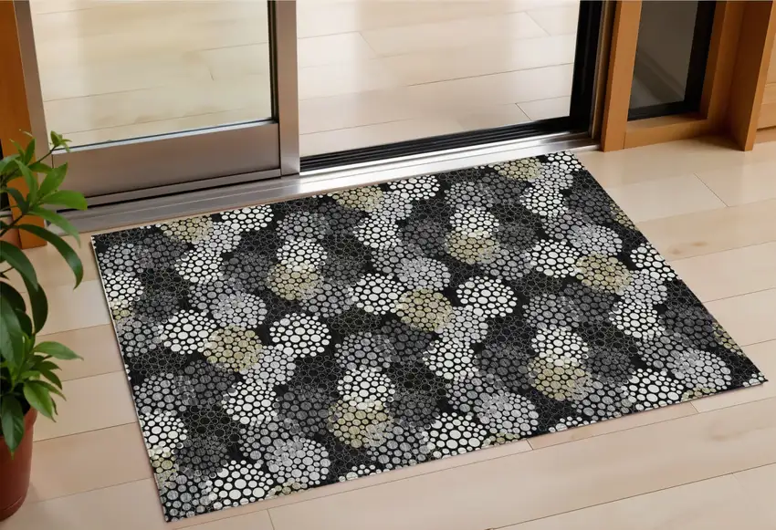 Black Gray And Ivory Polka Dot Washable Indoor Outdoor Area Rug Photo 1
