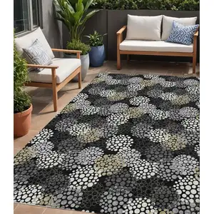 Photo of Black Gray And Ivory Polka Dot Washable Indoor Outdoor Area Rug