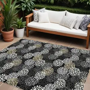 Photo of Black Gray And Ivory Polka Dot Washable Indoor Outdoor Area Rug