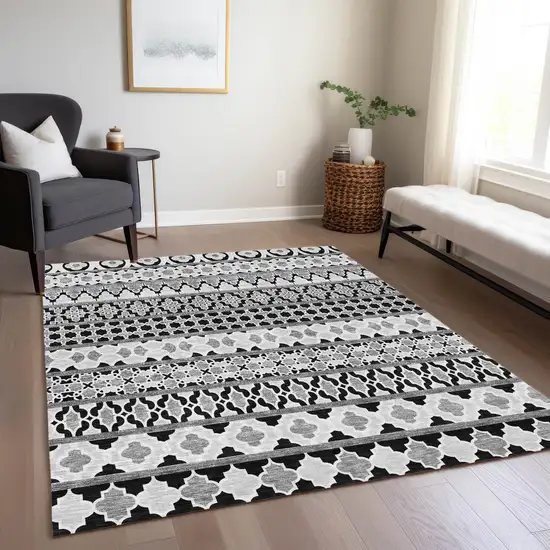 Black Gray And Ivory Quatrefoil Washable Indoor Outdoor Area Rug Photo 8