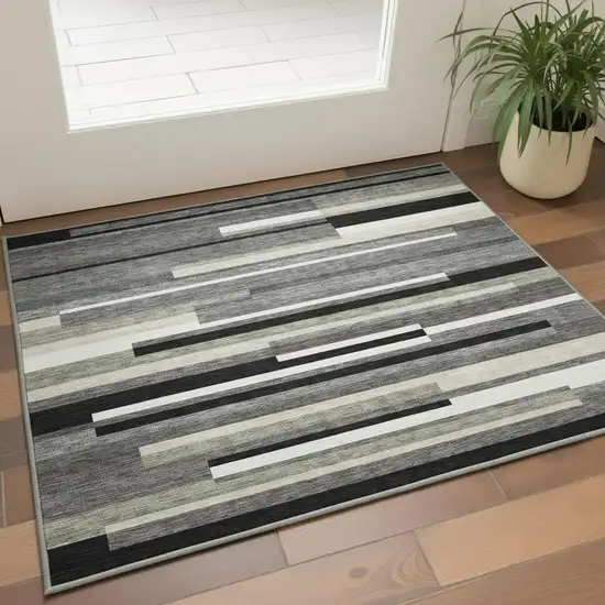 Black Gray And Ivory Striped Washable Area Rug With UV Protection Photo 2
