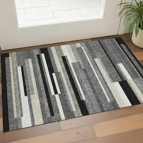 Black Gray And Ivory Striped Washable Area Rug With UV Protection Photo 1