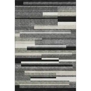 Photo of Black Gray And Ivory Striped Washable Area Rug With UV Protection