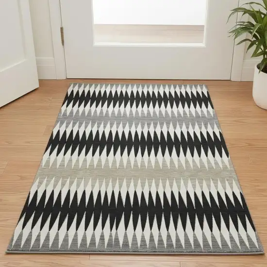 Black Gray And Ivory Striped Washable Area Rug With UV Protection Photo 2
