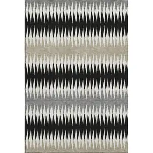 Photo of Black Gray And Ivory Striped Washable Area Rug With UV Protection