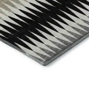 Photo of Black Gray And Ivory Striped Washable Area Rug With UV Protection