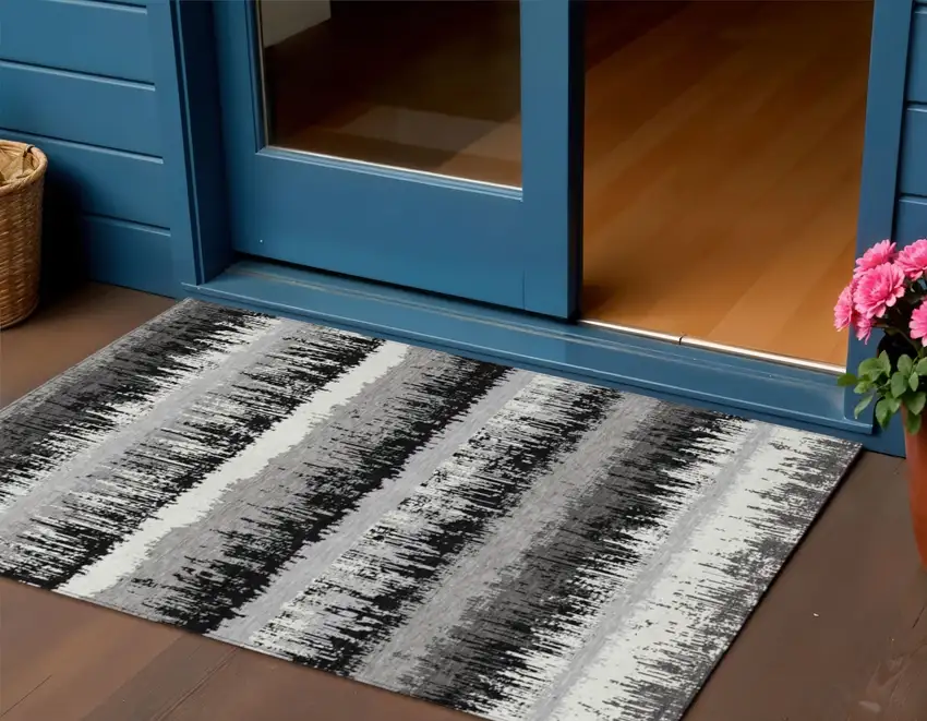 Black Gray And Ivory Striped Washable Indoor Outdoor Area Rug Photo 1