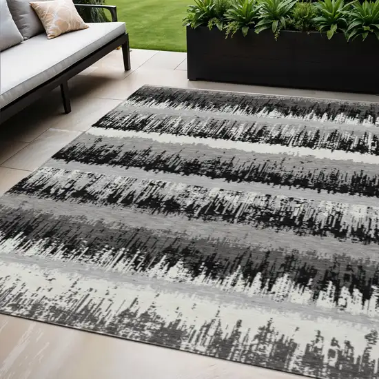 Black Gray And Ivory Striped Washable Indoor Outdoor Area Rug Photo 1