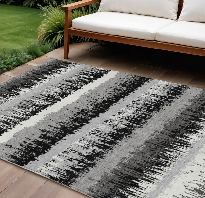 Black Gray And Ivory Striped Washable Indoor Outdoor Area Rug Photo 1