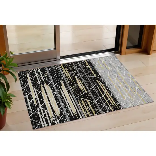 Black Gray And Ivory Striped Washable Indoor Outdoor Area Rug Photo 1