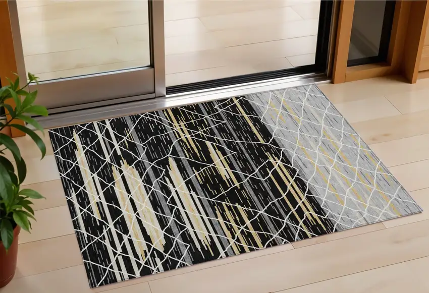 Black Gray And Ivory Striped Washable Indoor Outdoor Area Rug Photo 1