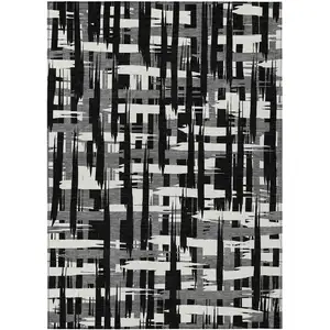 Photo of Black Gray And Ivory Striped Washable Indoor Outdoor Area Rug