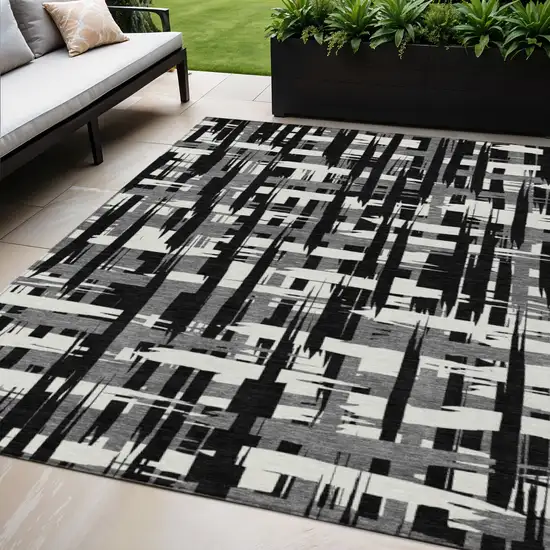 Black Gray And Ivory Striped Washable Indoor Outdoor Area Rug Photo 2