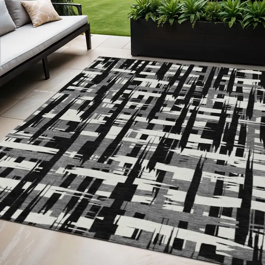 Black Gray And Ivory Striped Washable Indoor Outdoor Area Rug Photo 2