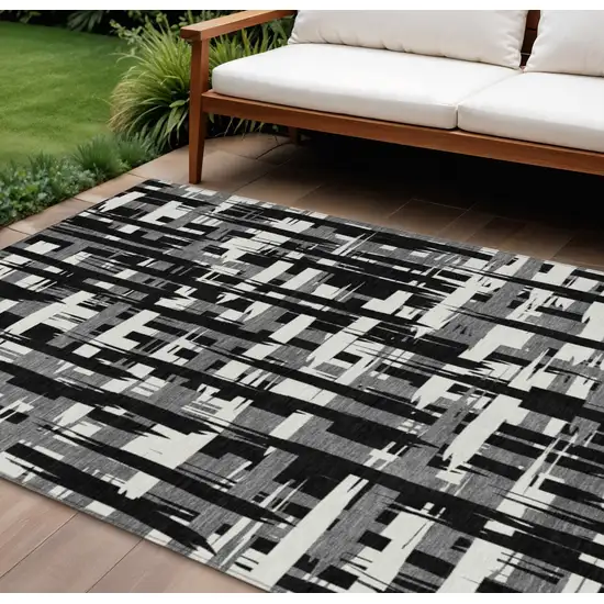 Black Gray And Ivory Striped Washable Indoor Outdoor Area Rug Photo 2