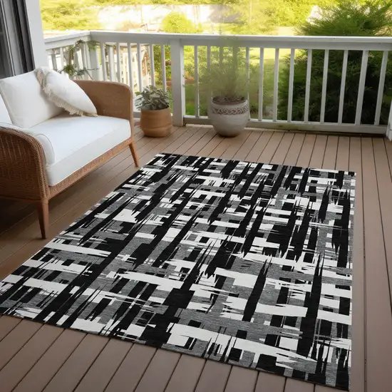 Black Gray And Ivory Striped Washable Indoor Outdoor Area Rug Photo 6