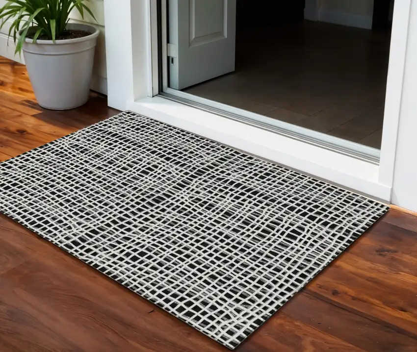Black Gray And Ivory Striped Washable Indoor Outdoor Area Rug Photo 1