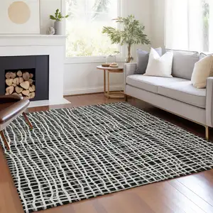 Photo of Black Gray And Ivory Striped Washable Indoor Outdoor Area Rug
