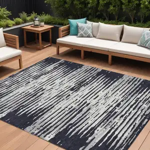 Photo of Black Gray And Ivory Striped Washable Indoor Outdoor Area Rug