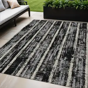 Photo of Black Gray And Ivory Striped Washable Indoor Outdoor Area Rug