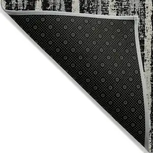 Photo of Black Gray And Ivory Striped Washable Indoor Outdoor Area Rug