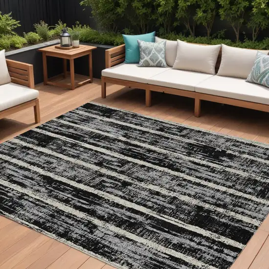 Black Gray And Ivory Striped Washable Indoor Outdoor Area Rug Photo 1