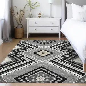 Photo of Black Gray And Ivory Tribal Washable Indoor Outdoor Area Rug
