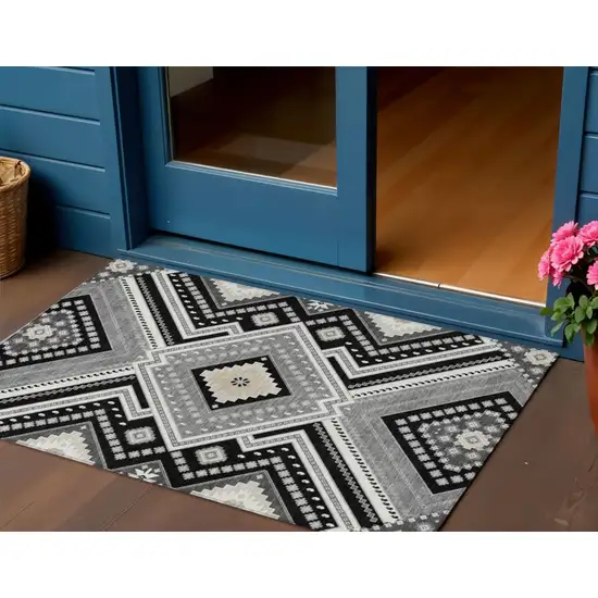 Black Gray And Ivory Tribal Washable Indoor Outdoor Area Rug Photo 1