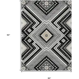 Photo of Black Gray And Ivory Tribal Washable Indoor Outdoor Area Rug