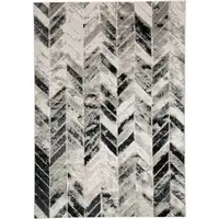 Photo of Black Gray And Silver Geometric Stain Resistant Area Rug