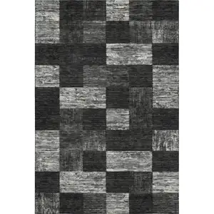 Photo of Black Gray And Silver Geometric Washable Area Rug With UV Protection
