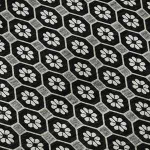 Photo of Black Gray And Silver Geometric Washable Area Rug With UV Protection