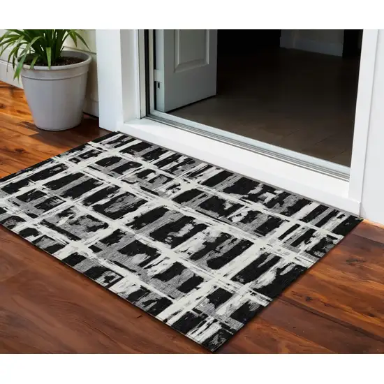 Black Gray And Silver Striped Washable Indoor Outdoor Area Rug Photo 1
