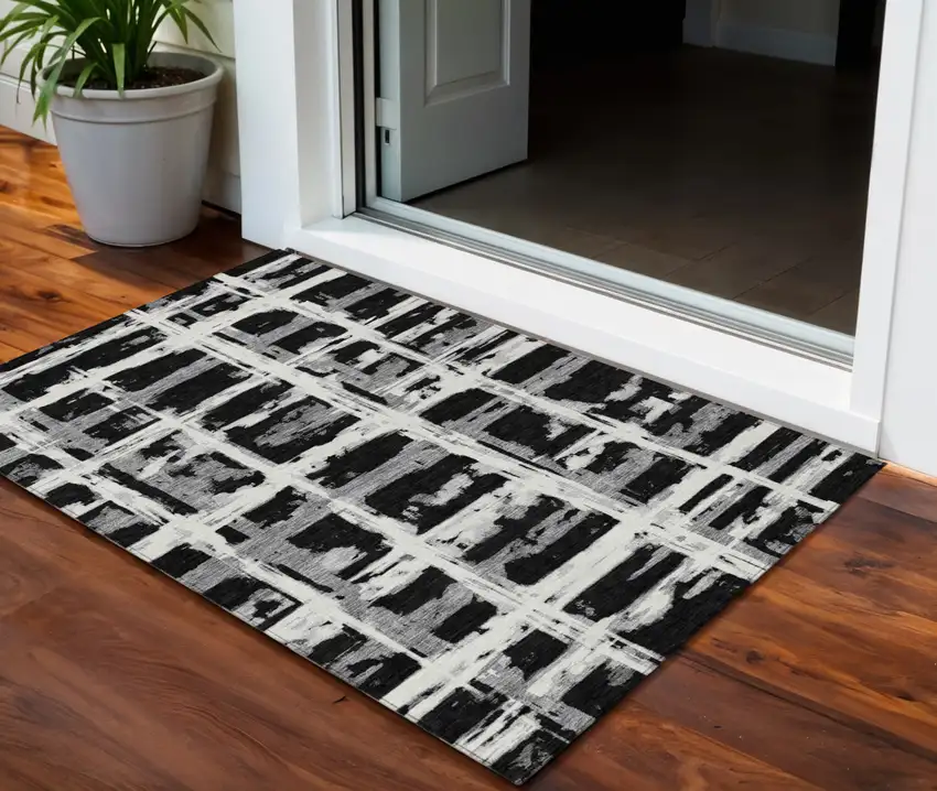 Black Gray And Silver Striped Washable Indoor Outdoor Area Rug Photo 1