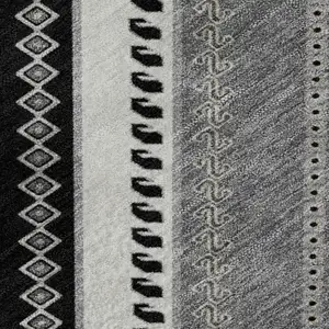 Photo of Black Gray And Silver Tribal Washable Area Rug With UV Protection