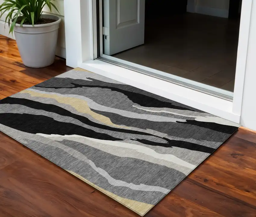 Black Gray And Tan Abstract Washable Indoor Outdoor Area Rug Photo 1