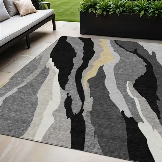 Black Gray And Tan Abstract Washable Indoor Outdoor Area Rug Photo 1