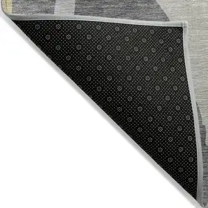 Photo of Black Gray And Tan Abstract Washable Indoor Outdoor Area Rug