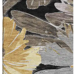 Photo of Black Gray And Wheat Floral Washable Area Rug With UV Protection
