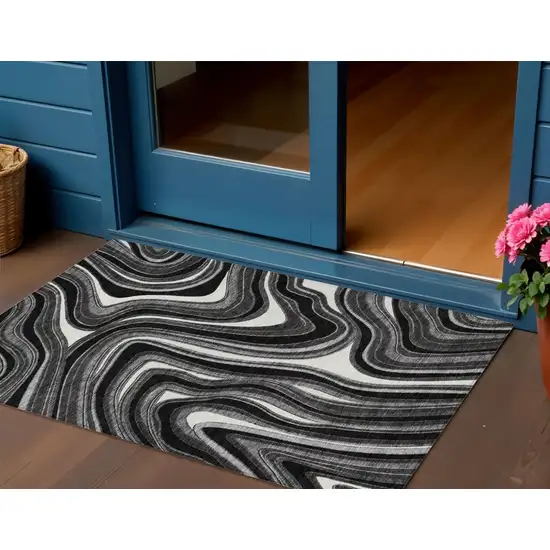 Black Gray And White Abstract Washable Indoor Outdoor Area Rug Photo 1