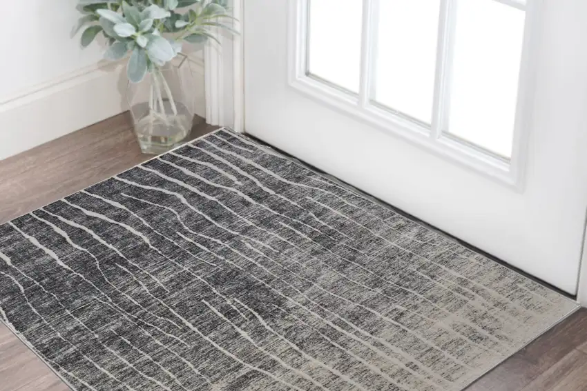 Black Gray and Ivory Abstract Power Loom Area Rug Photo 1