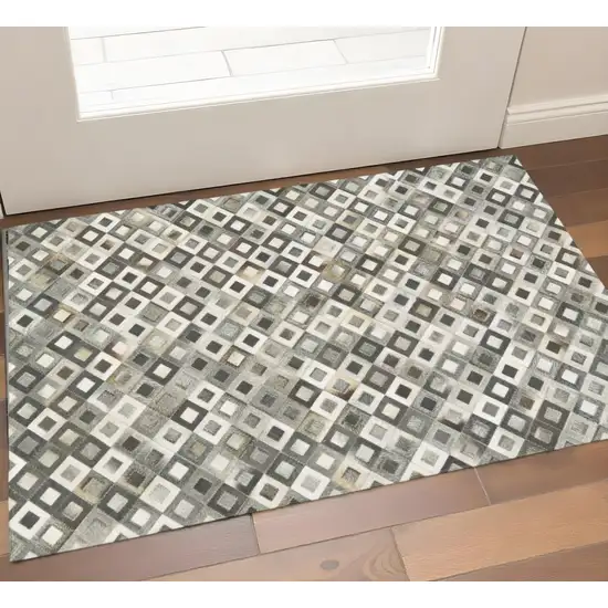 Black Gray And White Faux Cowhide Geometric Area Rug Photo 1