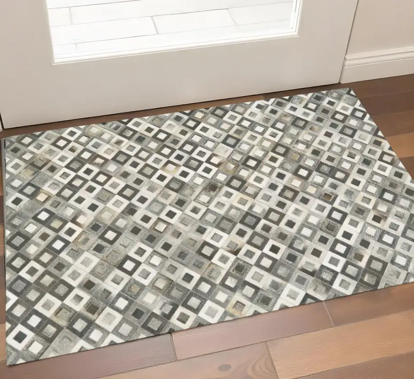 Black Gray And White Faux Cowhide Geometric Area Rug Photo 1