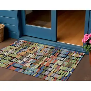 Photo of Black Green And Blue Abstract Washable Indoor Outdoor Area Rug