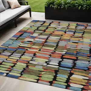 Photo of Black Green And Blue Abstract Washable Indoor Outdoor Area Rug